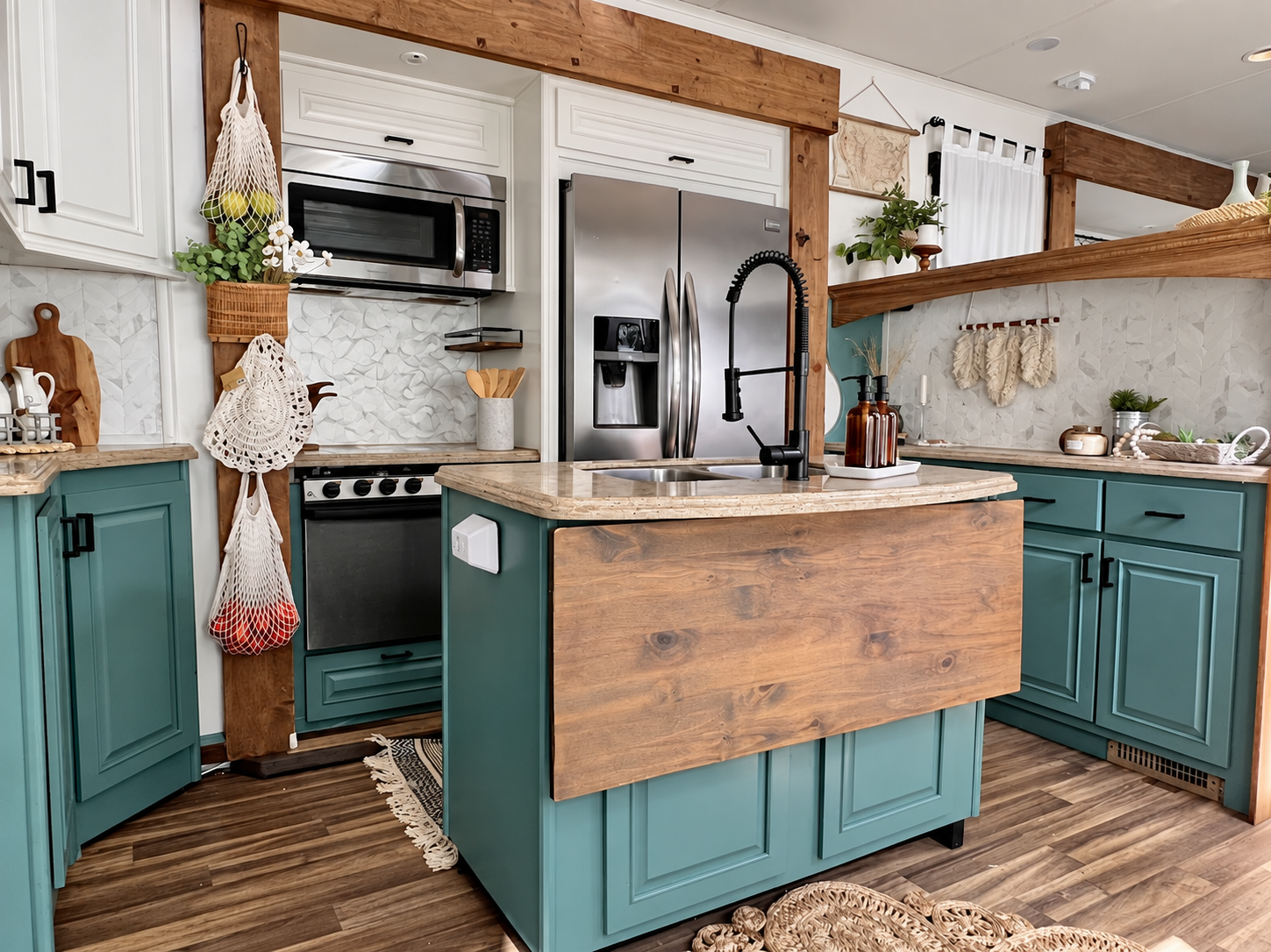 RV interior after renovation — fully renovated kitchen with custom woodwork