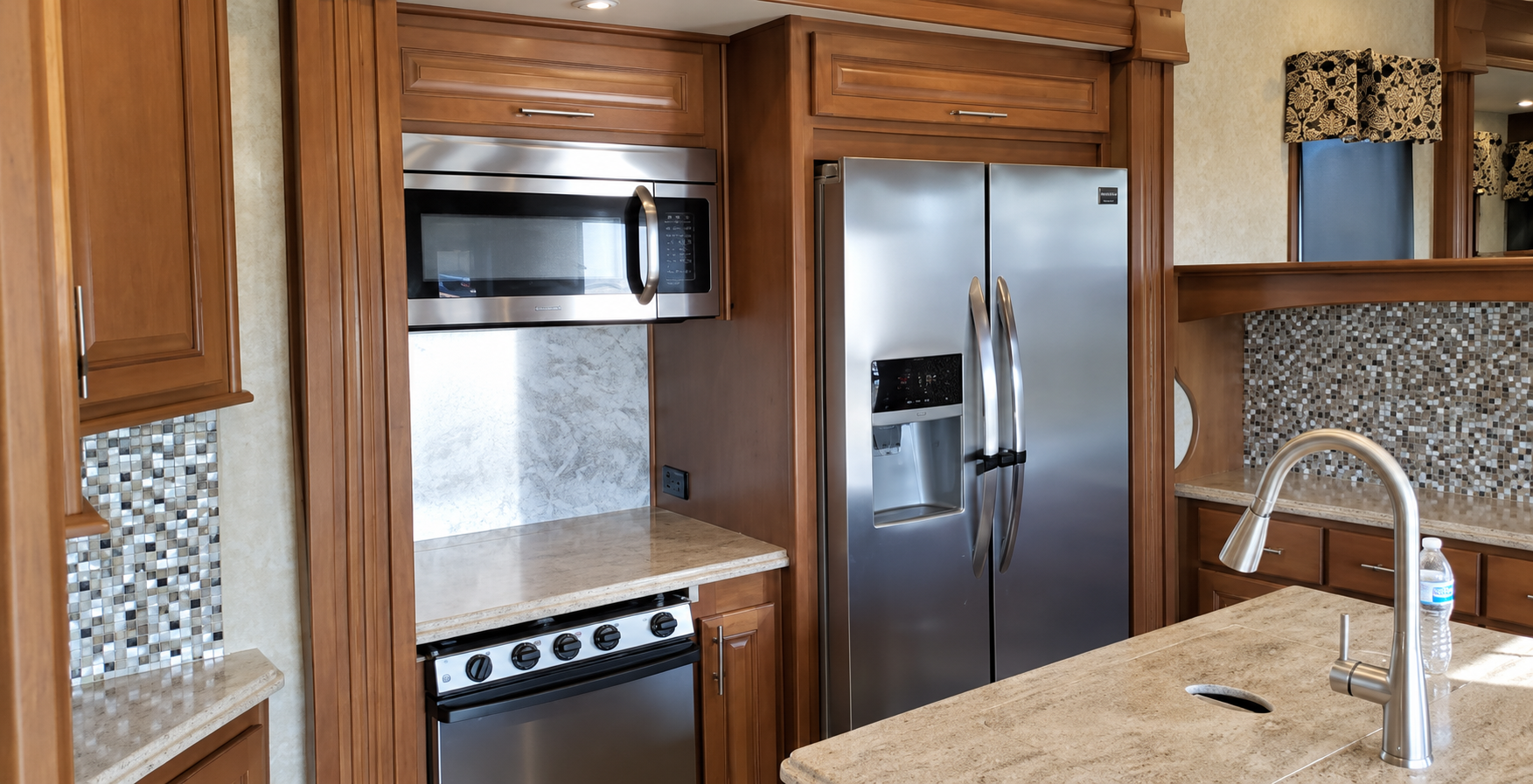 RV interior before renovation — original kitchen and living space