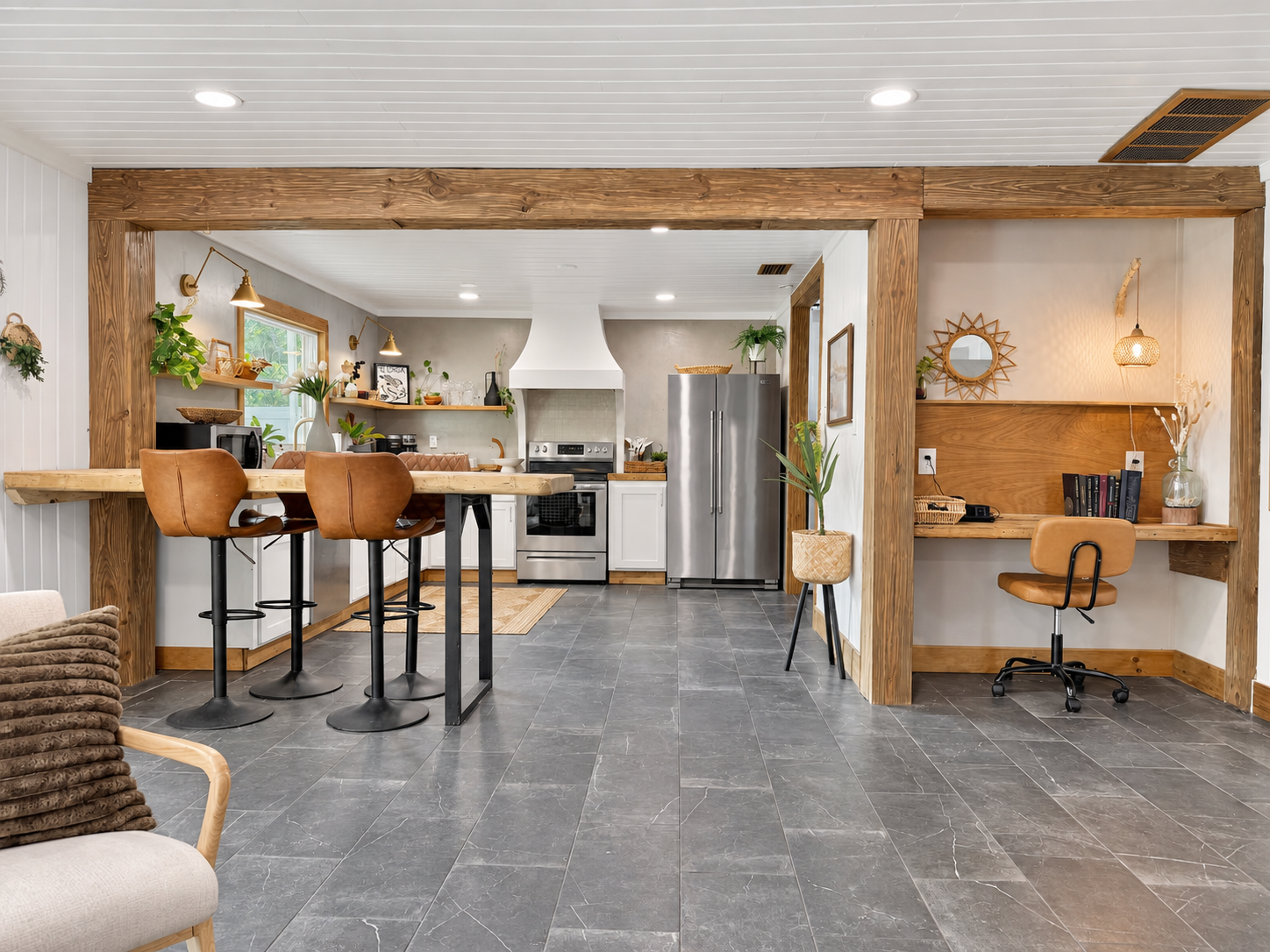 Kitchen after renovation by Madeira Studios — open kitchen with custom built-ins