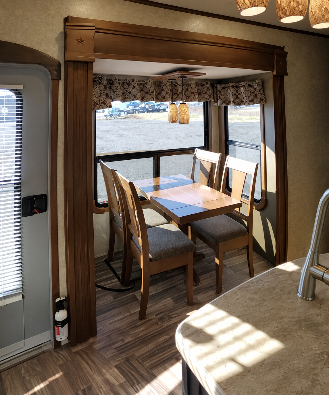 RV dining area before renovation — original table and seating